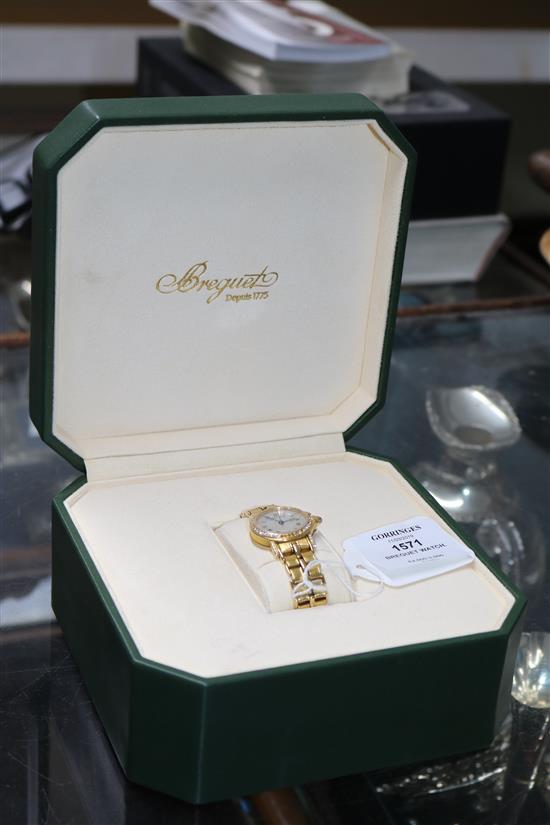 A ladys 18ct gold and diamond set Breguet wrist watch,